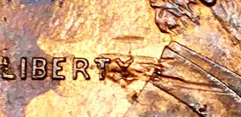 1995-D-Lincoln-Raised-Plating-Under-Ty-Of-Liberty-On-Obverse?
